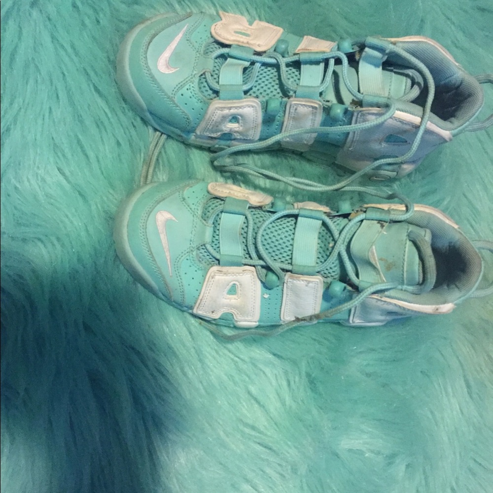 Teal and white Ir Nike’s